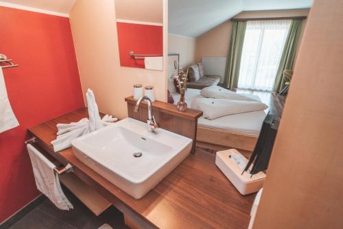 Cama o camas de una habitación en Landgasthof Wöhrer