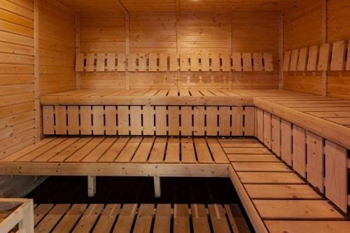 an inside of a wooden sauna at Baymont by Wyndham Perrysburg-Toledo in Perrysburg