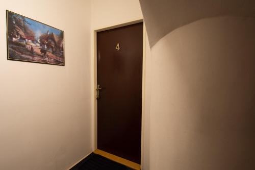 a door in a room with a picture on the wall at Red Point in Tábor