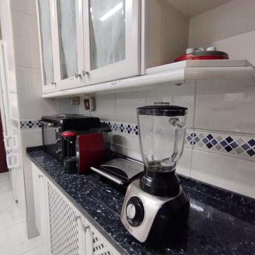 a blender sitting on a counter in a kitchen at Hotel Tuul Etxea in Galdakao