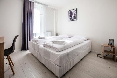 Postel nebo postele na pokoji v ubytování Hotel Rajka