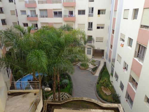 an aerial view of a courtyard in a apartment building at Casa Home in Casablanca