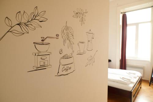a room with a wall with a plant sticker on it at Old City Hotel in Lviv