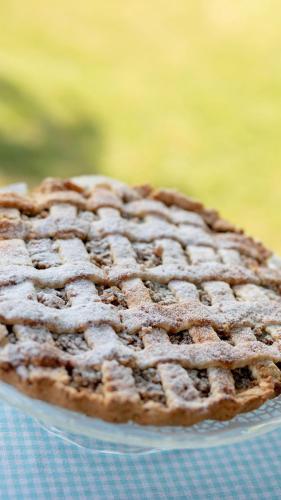 a pie sitting on a plate on a table at Deniz Kabugu Hotel in Alacati