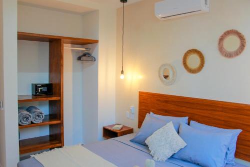 Ένα ή περισσότερα κρεβάτια σε δωμάτιο στο Gama 09 Apartments