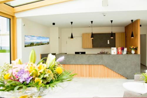 Η κουζίνα ή μικρή κουζίνα στο Garni Eden Hotels