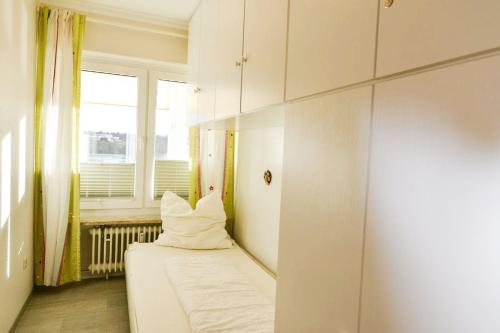 Katil atau katil-katil dalam bilik di Strandhochhaus SHB1