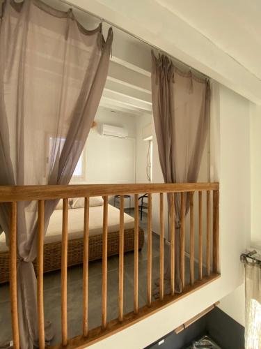 Llit o llits en una habitació de DUPLEX CALVI DIRECT PLAGE