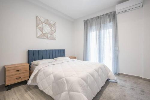 Posteľ alebo postele v izbe v ubytovaní Athens Luxurious Apartment