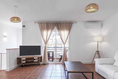 Televízia a/alebo spoločenská miestnosť v ubytovaní Casa La Granatilla, San José