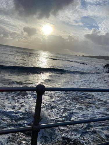a view of the ocean from a boat at Adorable bedsit for you, partner and your pet! in Pembrokeshire