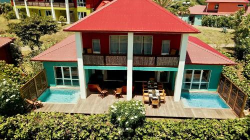 an aerial view of a house with a swimming pool at Villa Maorie 5 chambres avec piscine privée in Le François