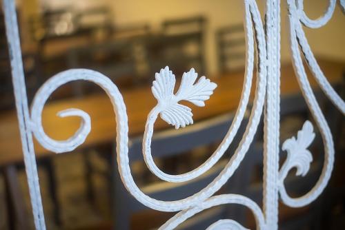 a close up of the back of a white bench at sweet dreams bakuriani in Bakuriani