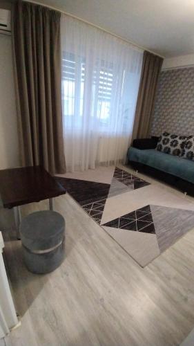 Ένα ή περισσότερα κρεβάτια σε δωμάτιο στο Ana Apartament