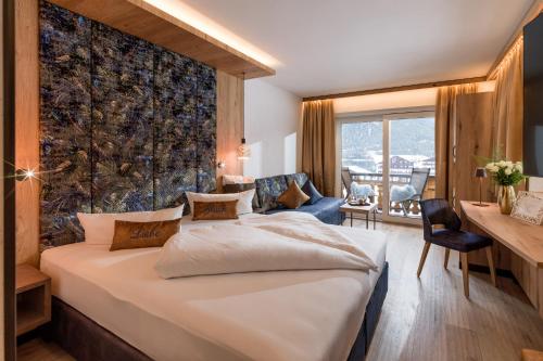 Posteľ alebo postele v izbe v ubytovaní Liebes Caroline 4-Sterne-Hotel