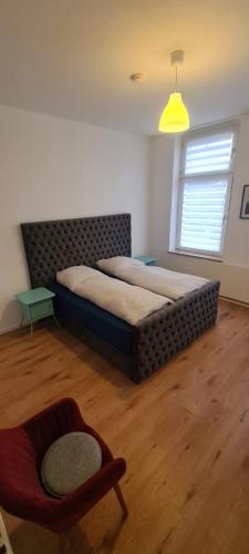 Ένα ή περισσότερα κρεβάτια σε δωμάτιο στο 2Zimmer Apartment mit Stellplatz