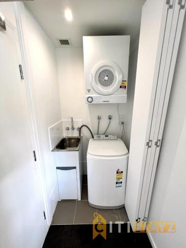 a small bathroom with a sink and a toilet at Bold in Bruce - 1bd 1bth 1csp in Belconnen