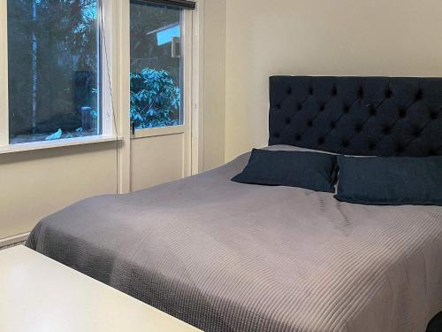 Postel nebo postele na pokoji v ubytování Holiday home PRÄSSEBO II