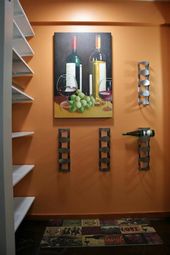 a wine cellar with wine glasses and wine racks at Hilltop Hideaway, Pacific Northwest charm & luxury in Portland