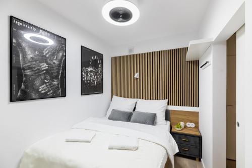 Posteľ alebo postele v izbe v ubytovaní P&O Apartments Okrzei - Stara Praga