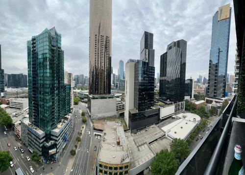 an aerial view of a city with tall buildings at Stylish Southbank apartment Plus Free Parking for 2 Cars in Melbourne