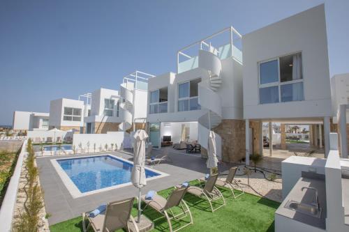 an image of a villa with a swimming pool at Vie Bleu Villas in Protaras