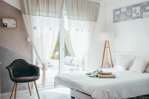 Katil atau katil-katil dalam bilik di Gîte "Le Mesminois" établissement avec espace bien-être et sauna