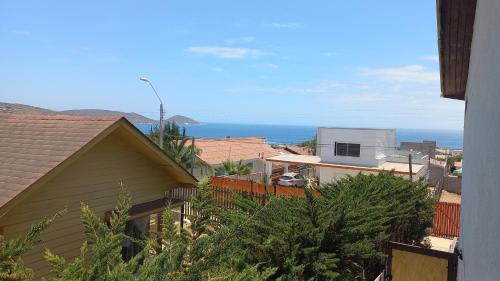 a view of the ocean from a house at Departamentos villamar guanaquero in Coquimbo