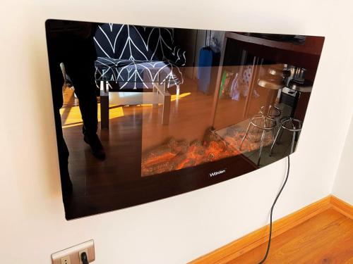 TV a/nebo společenská místnost v ubytování San Andres Suite Apartments