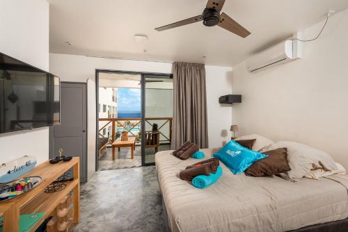 Postel nebo postele na pokoji v ubytování Bloozz resort Bonaire