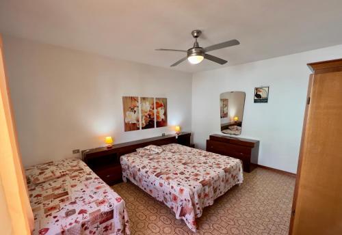 Una cama o camas en una habitación de Appartamenti Via Roma 41