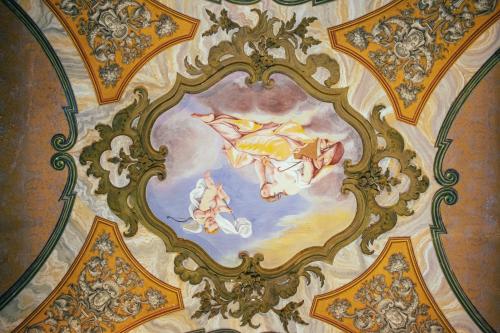 a ceiling in a building with a painting on it at Bosone Palace in Gubbio