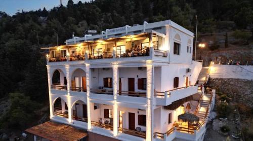 an aerial view of a building at night at Spongia Apartments Kalymnos in Kalymnos