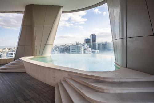 a view of a pool from a building at 360 Nicosia - 2 bedrooms Luxury Residence in Nicosia