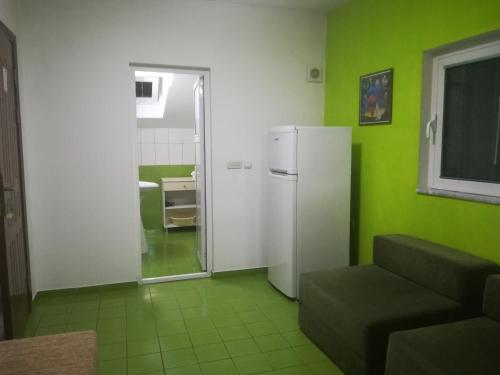 Dapur atau dapur kecil di Karoski Apartments & Suites