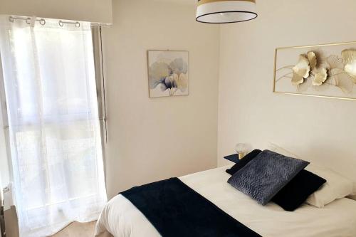 Posteľ alebo postele v izbe v ubytovaní LE RETRO