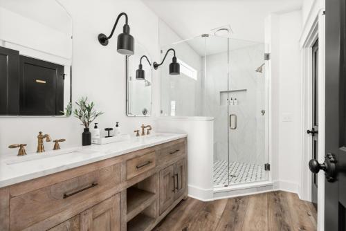 a bathroom with a sink and a shower at Southbound Stays - Country Cottage in Nashville