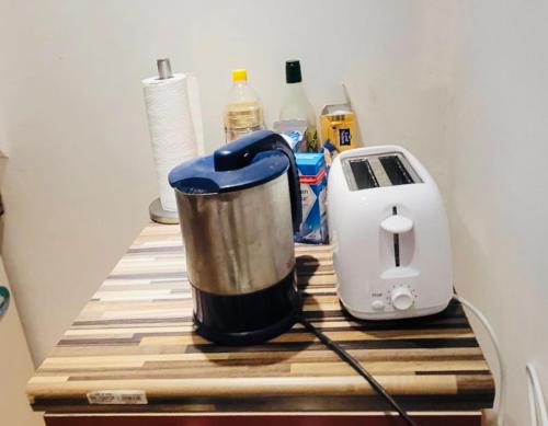 a blender and a toaster sitting on a counter at Monteurzimmer/Ferienwohnung/Pension in Siegen