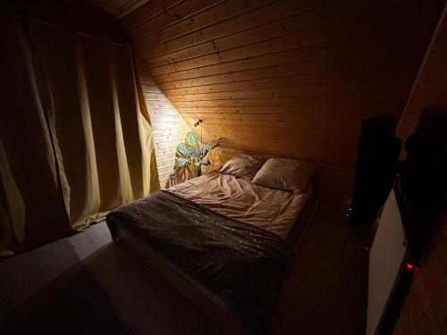 Postel nebo postele na pokoji v ubytování Dom Małe Mazury