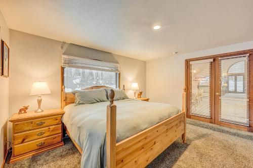 a bedroom with a large bed and a window at Donner Lake House in Truckee