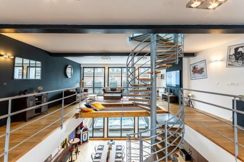 Ruang duduk di Le 48-GregIMMO-Appart'Hôtel