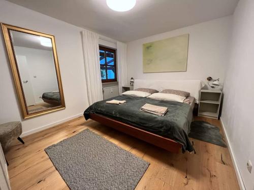 Postel nebo postele na pokoji v ubytování Garten-Ferienwohnung Seppi