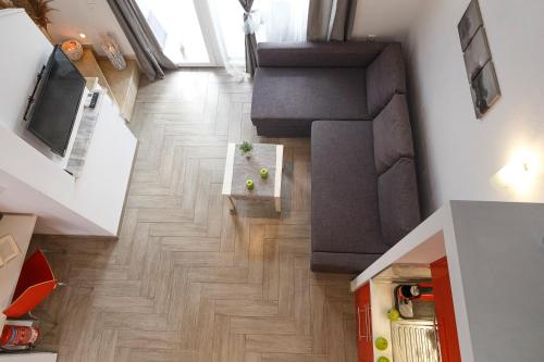 Televízia a/alebo spoločenská miestnosť v ubytovaní Villa Pearl