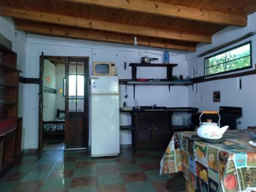 Virtuvė arba virtuvėlė apgyvendinimo įstaigoje EL MONTECITO