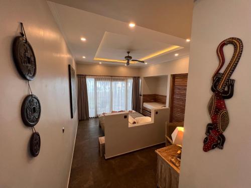 Кровать или кровати в номере Relax Bali Dive & SPA ocean front resort