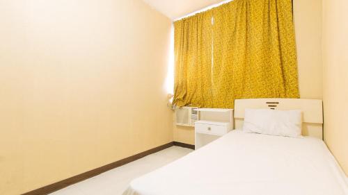 Llit o llits en una habitació de Waterfun Condominium Hostel