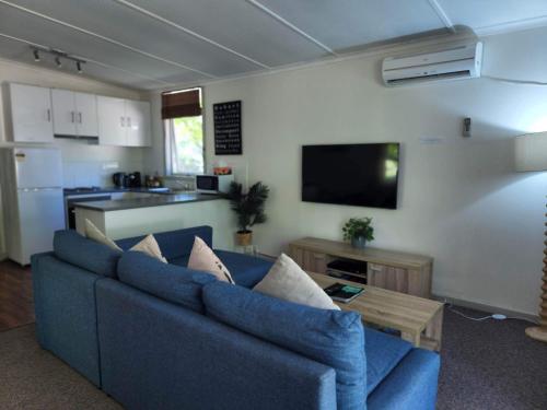 A seating area at Russell Falls Holiday Cottages