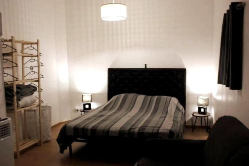 Postel nebo postele na pokoji v ubytování Au cœur de Saint Chamas