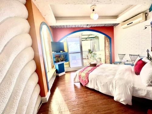 Postel nebo postele na pokoji v ubytování Ming Jun Homestay