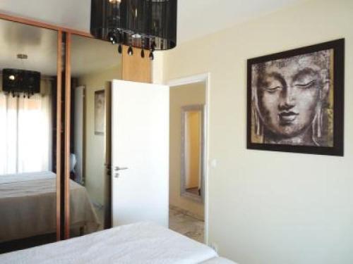 Posteľ alebo postele v izbe v ubytovaní Stylish one bedroom apartment in Central Cannes just off the Croisette and near beaches - 680